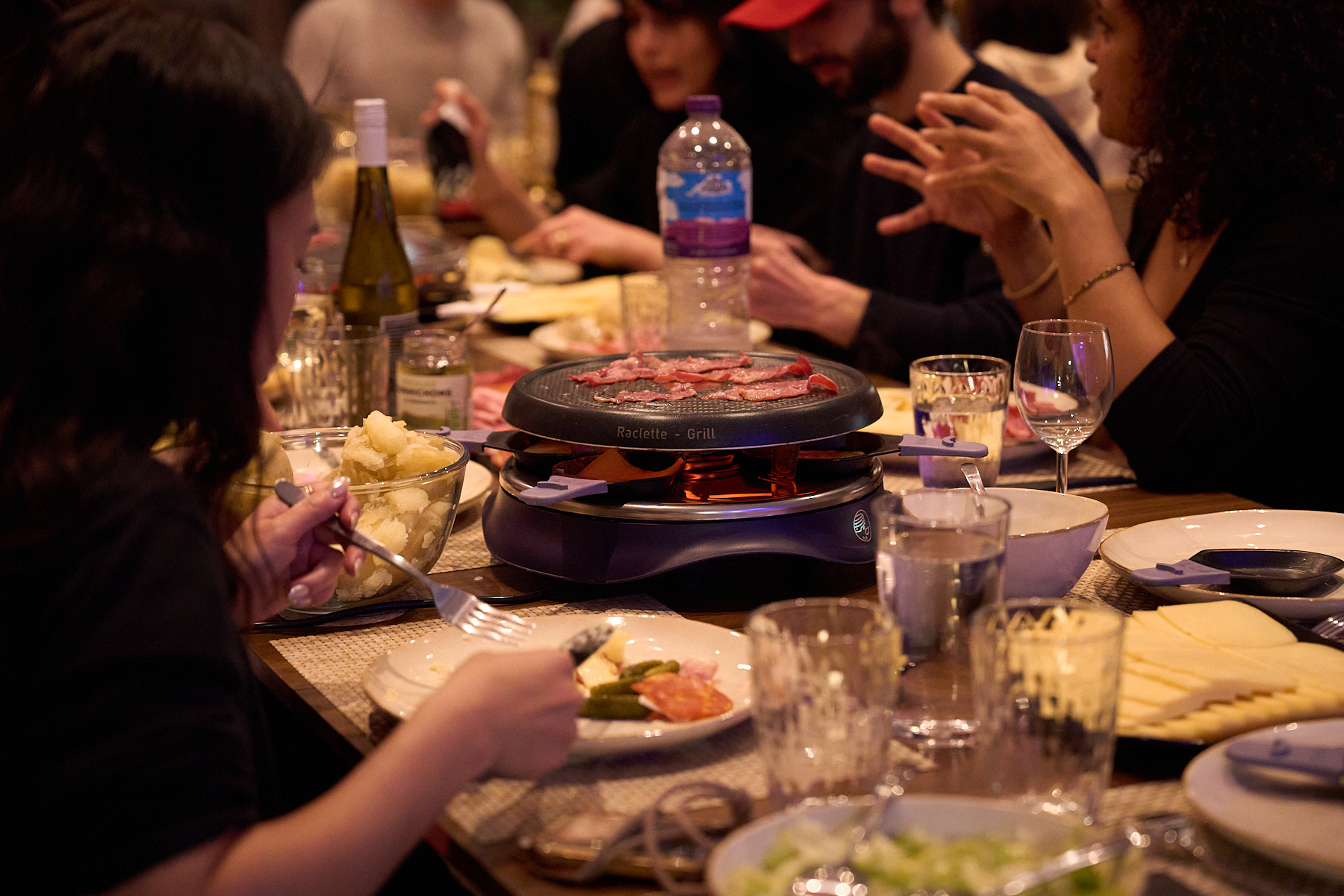 Close-up of guests enjoying a private dinner in the Old Street penthouse event space