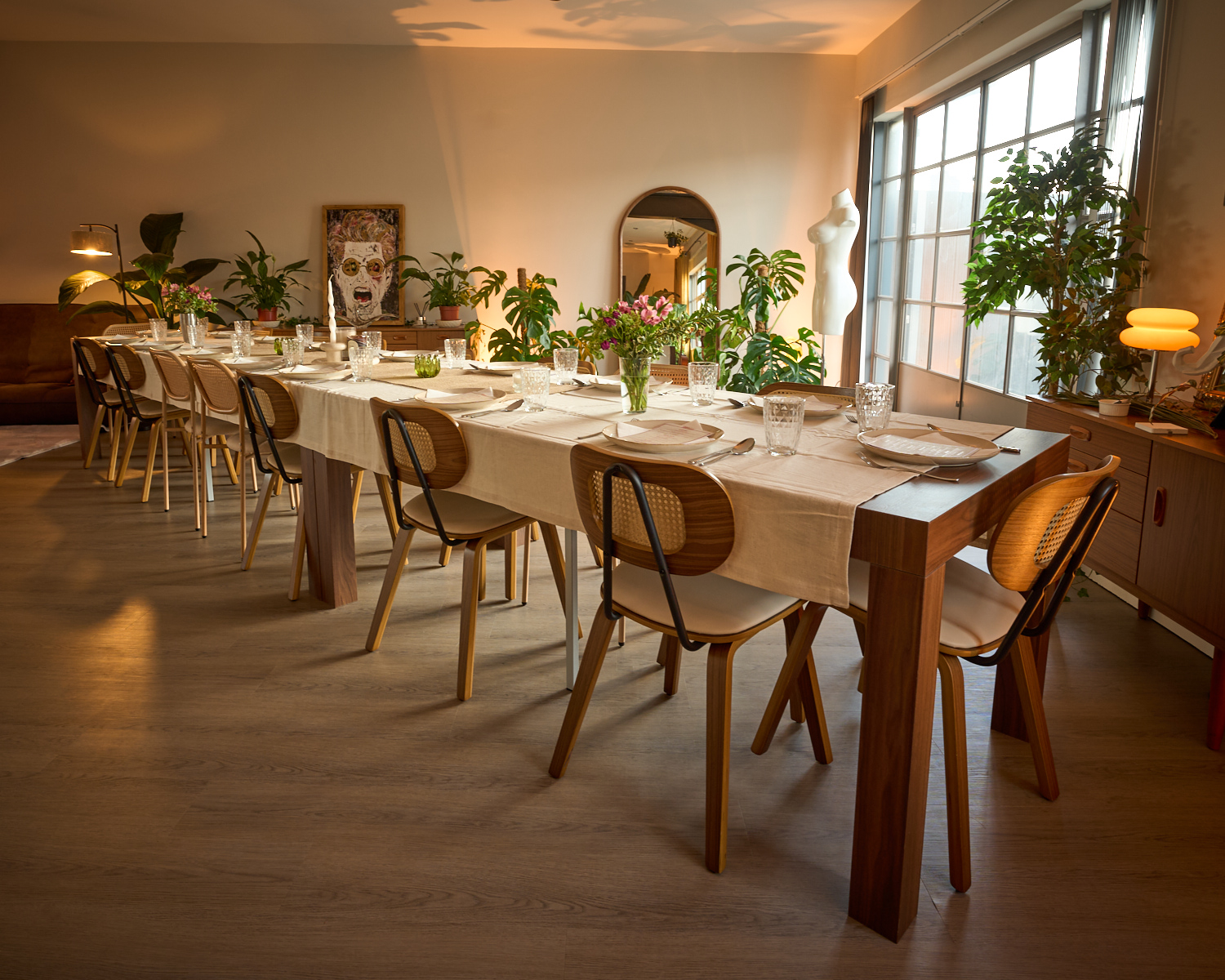 Seated dinner configuration in the designer penthouse, styled for an intimate gathering