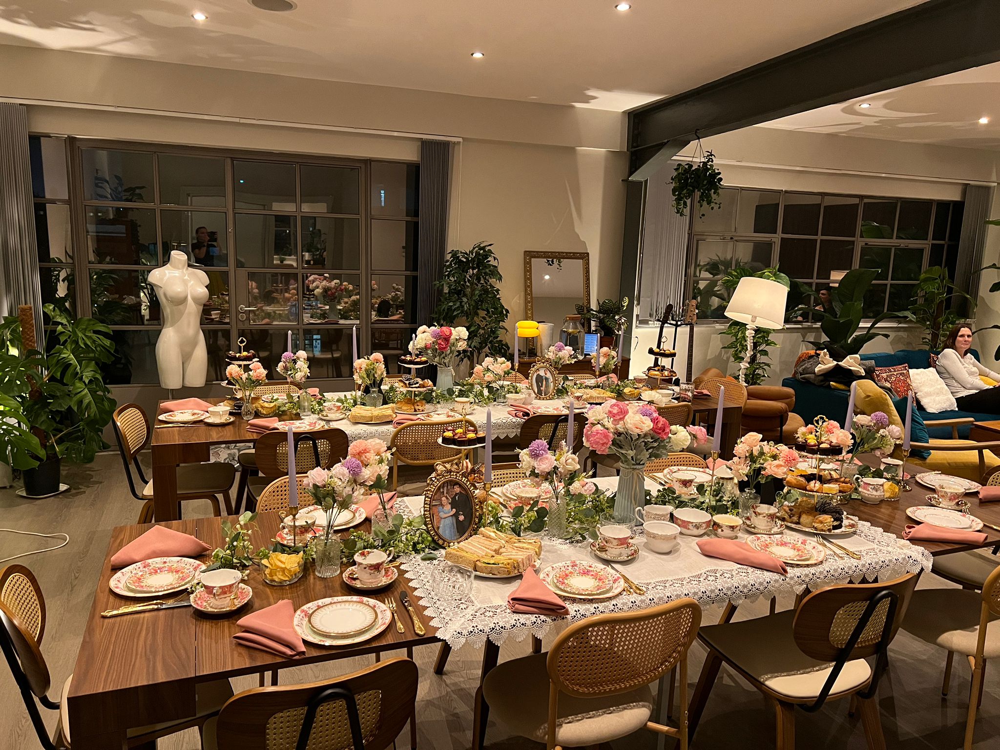 Long-table dinner setup in the industrial penthouse loft, Old Street London
