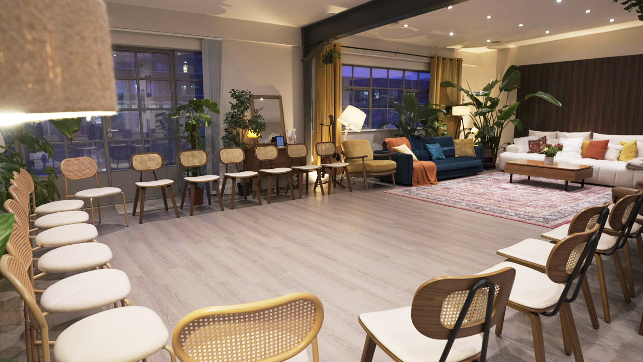 Theatre-style seating layout with chairs around an open space, a flexible event configuration in the penthouse