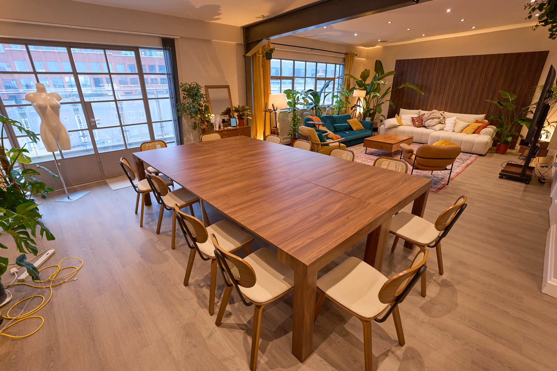 Boardroom-style long table configuration in the spacious open-plan penthouse, Old Street London