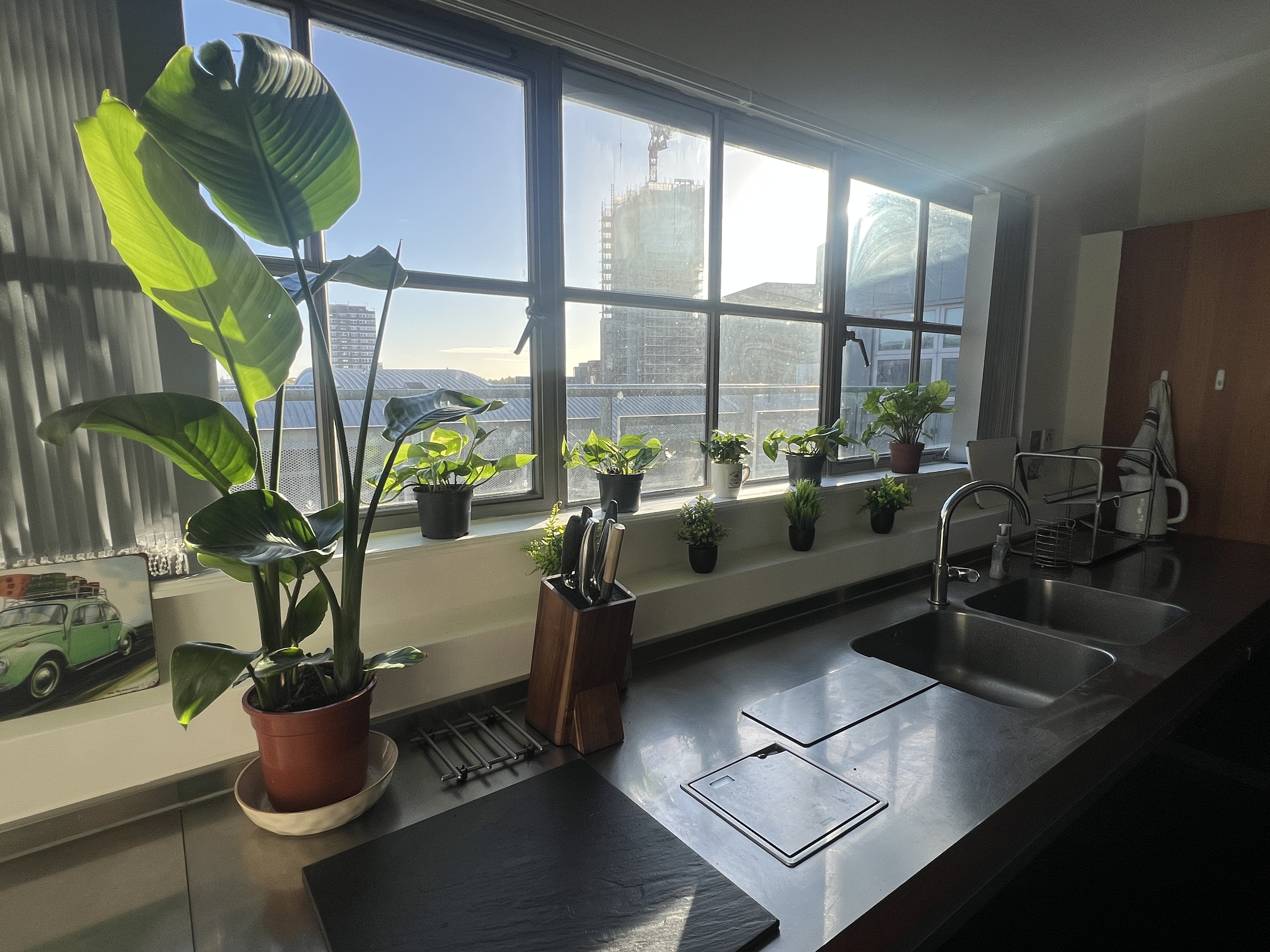 Fully equipped kitchen interior with oven, hob, and modern worktops at The Designer's Penthouse