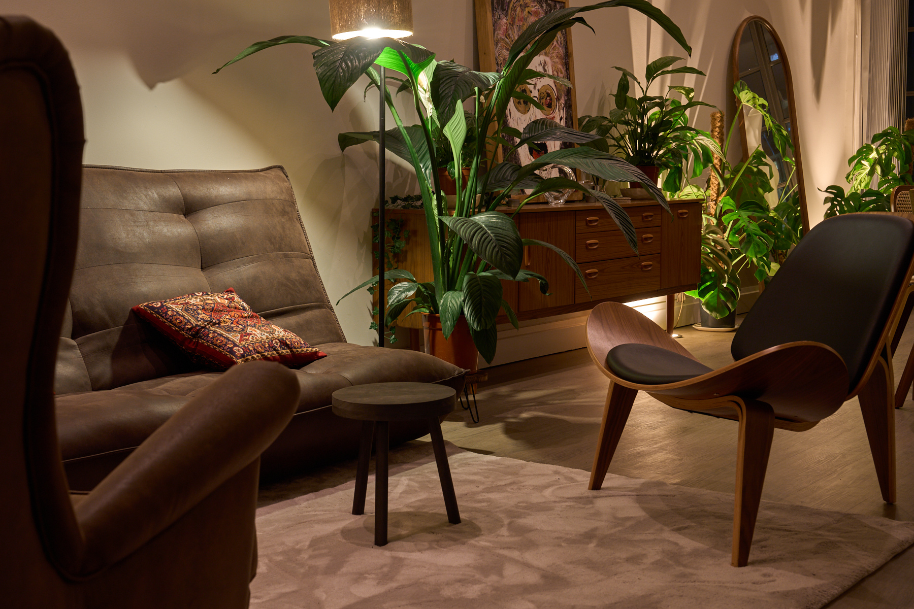 Library corner with curated books and shelving, a styled reading nook in the Old Street penthouse