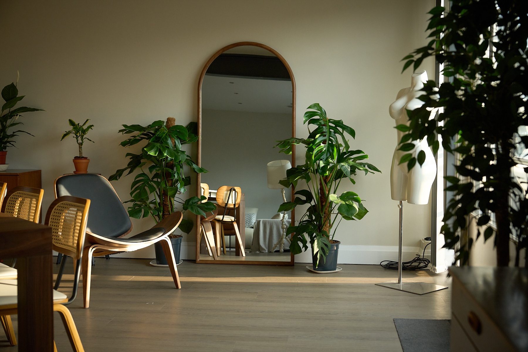 Mirror corner with warm reflected light, an interior detail at The Designer's Penthouse, Old Street