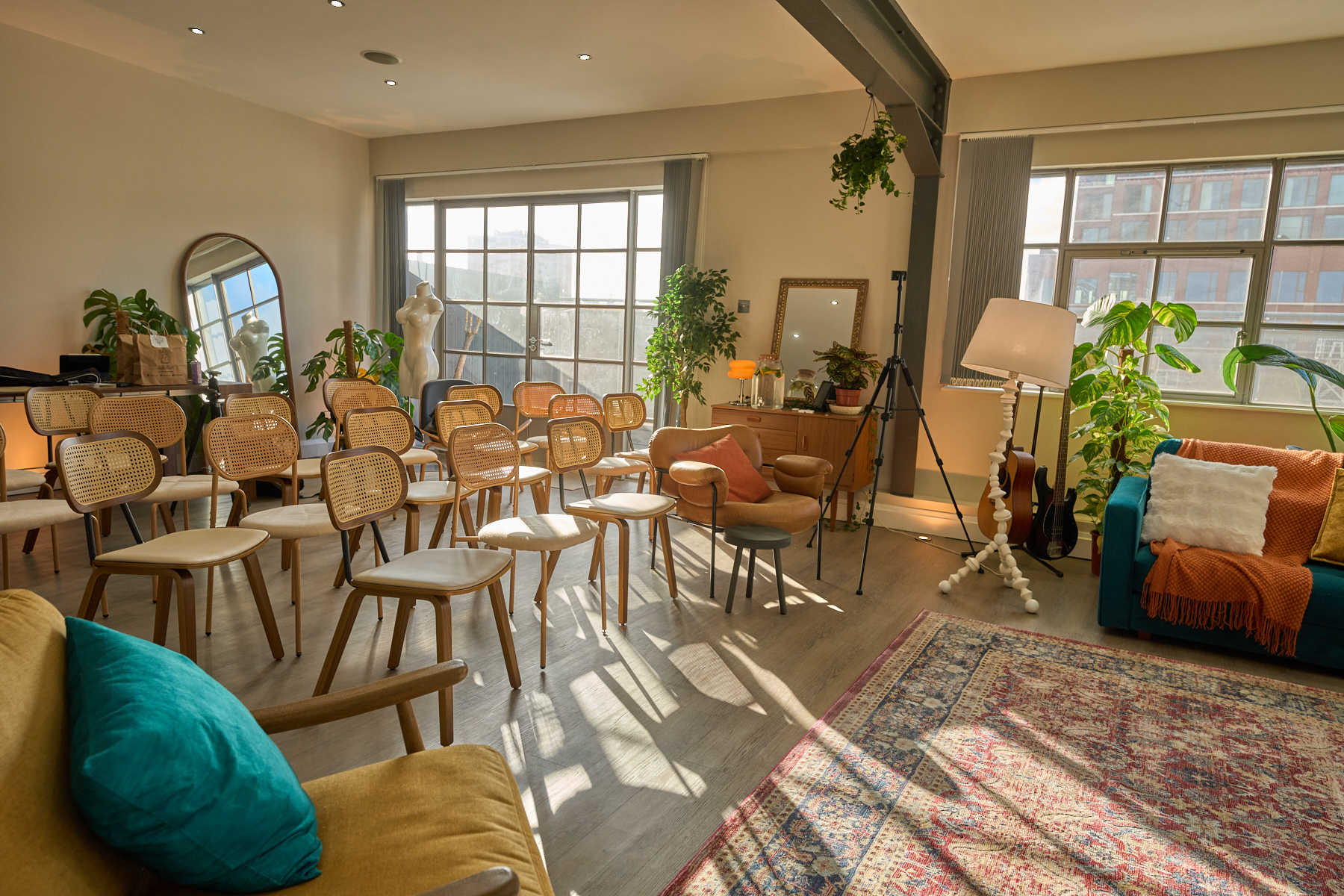 Designer sofa and furniture with south-facing natural light in the penthouse lounge