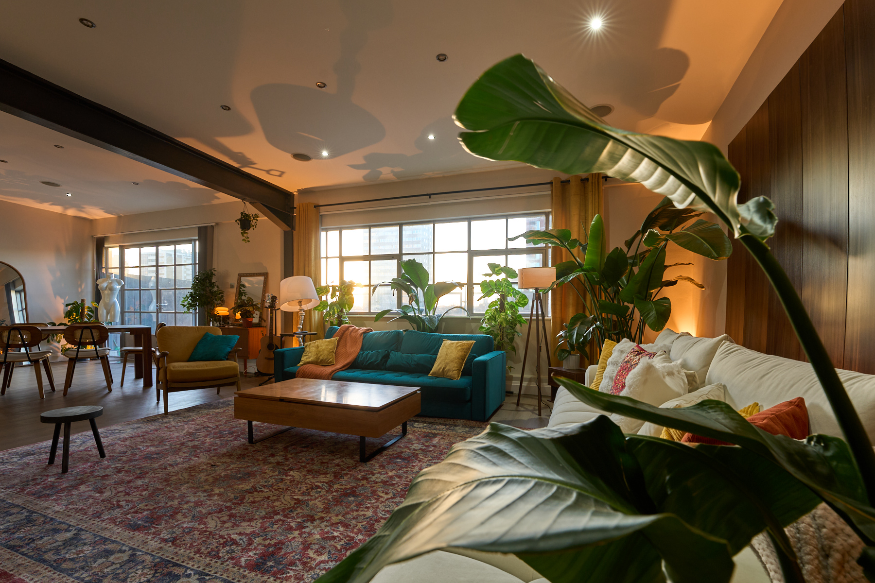 Open lounge area with layered textures and premium furniture at The Designer's Penthouse, Shoreditch