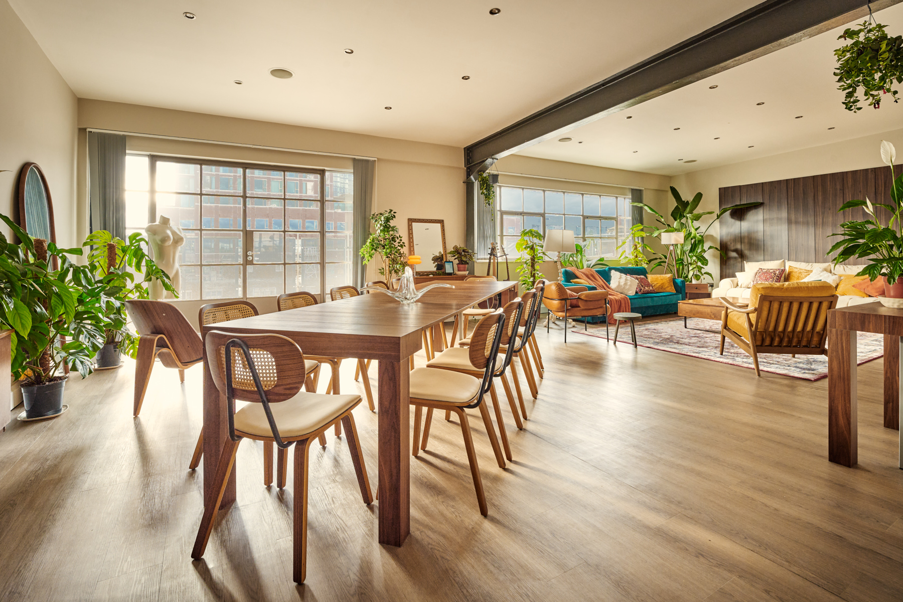 Table and plants in natural south-facing daylight at The Designer's Penthouse, Old Street