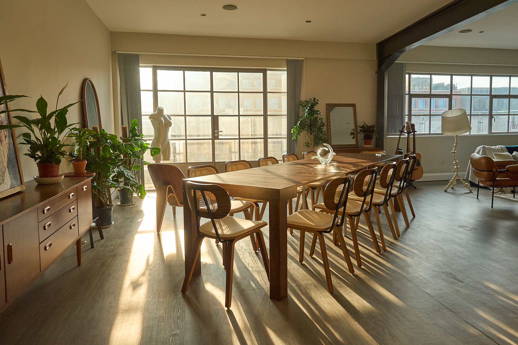 Large dining table setup in a Shoreditch penthouse, designed for collaborative work, team meetings, and events.