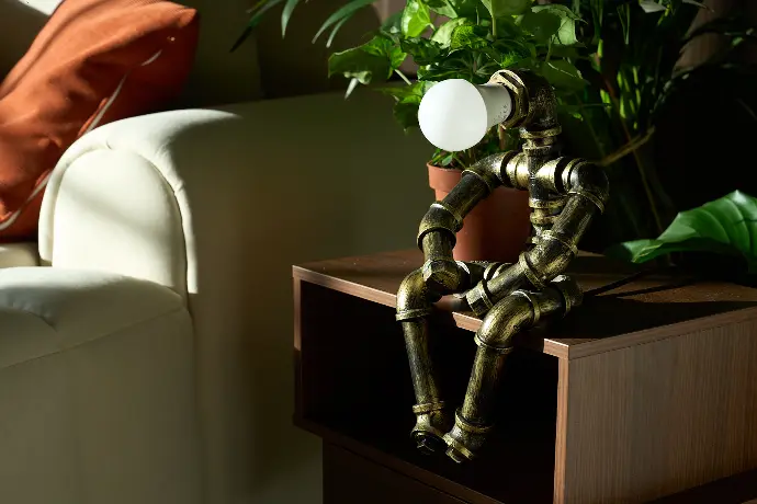 Sunlit dining space in a London penthouse with wooden table and chairs, perfect for workshops, meetings, and private events.