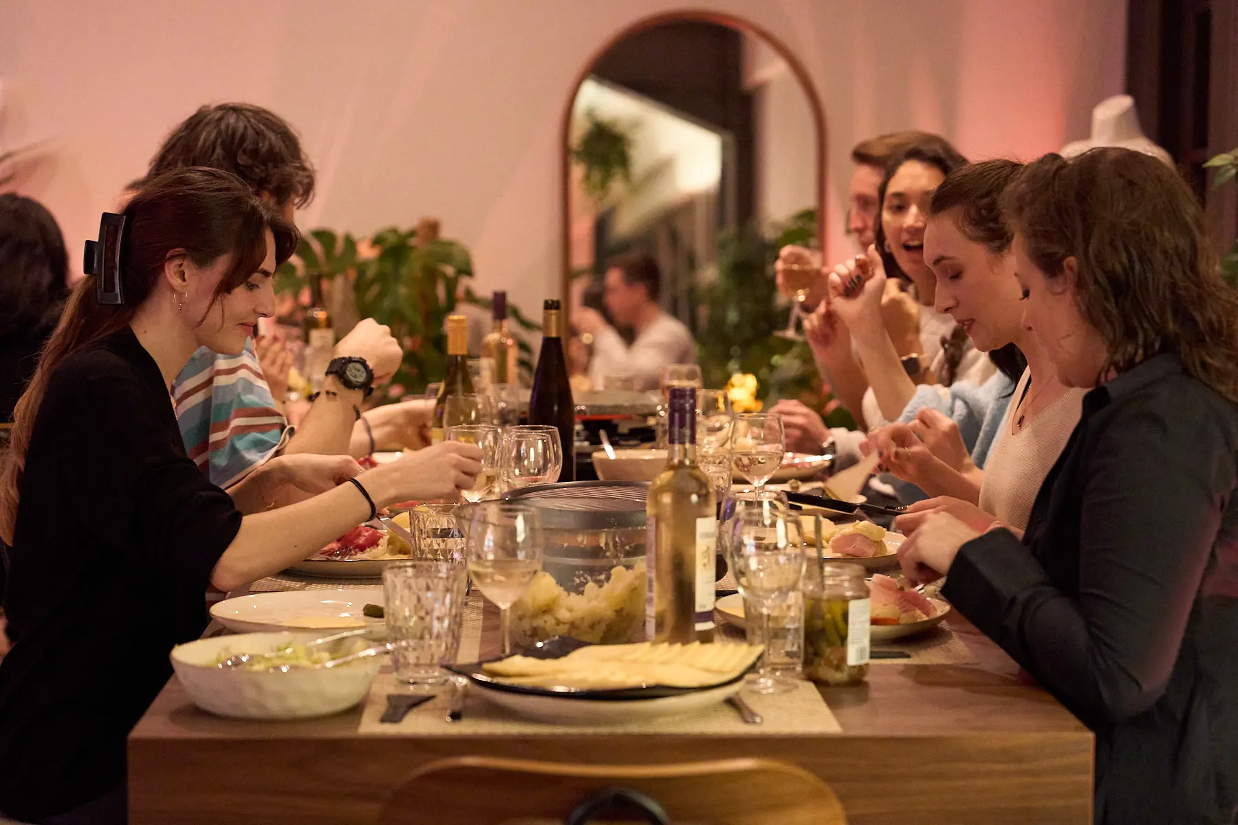 Group dinner event in a London penthouse, featuring a long table setup for social and networking moments.