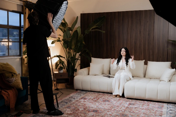 Behind-the-scenes filming setup inside a Shoreditch penthouse, equipped for professional video production.